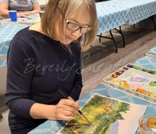 woman painting in watercolour