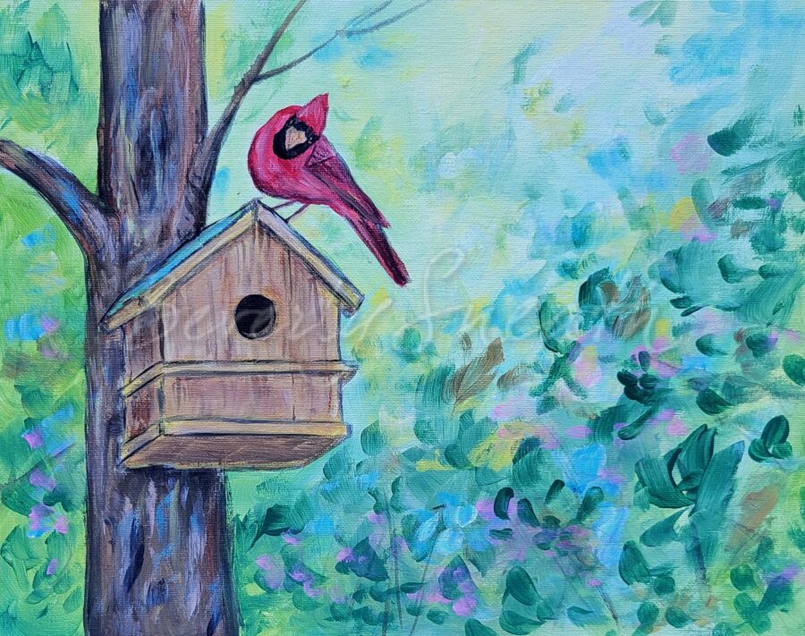 Cardinal on a birdhouse